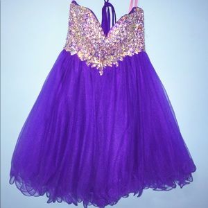 A short, formal/homecoming dress. Only worn once.